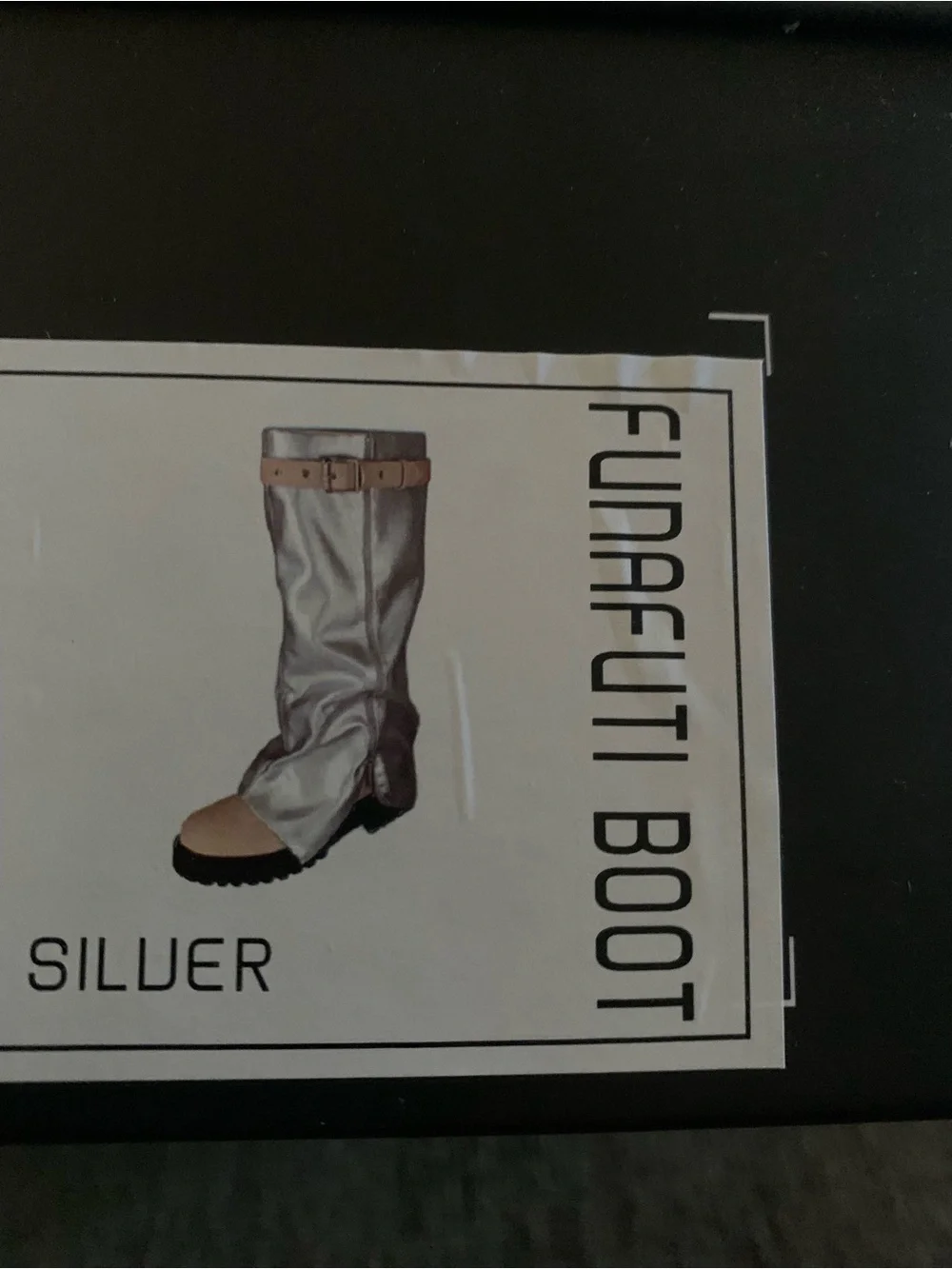 Cape Robbin striking metallic silver fold-over lug-sole boots feature a tan base